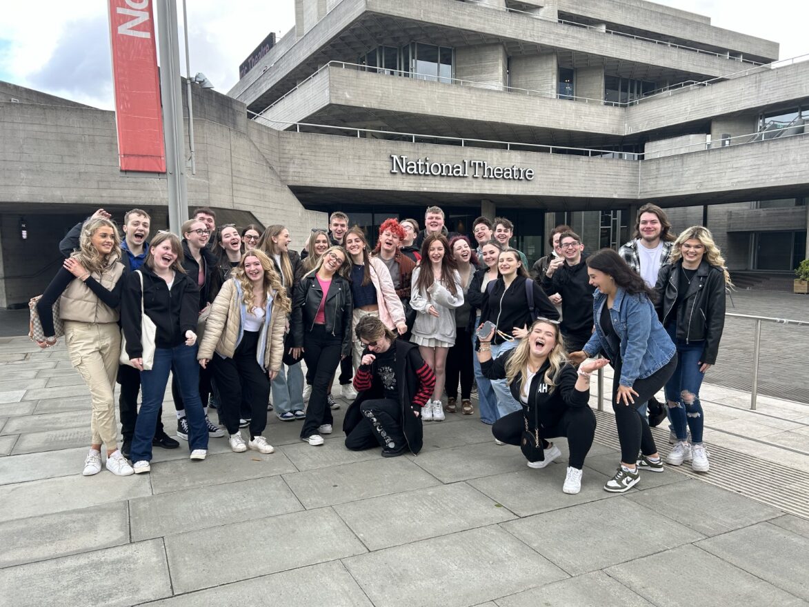 91 Students stood excitedly outside of the National Theatre in London